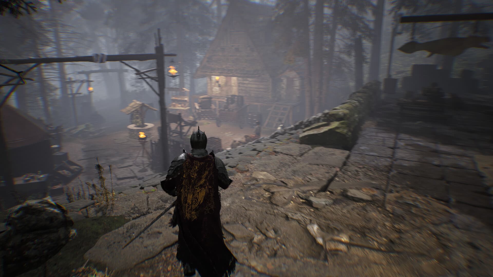 An armored character enters a misty village along a stone road.