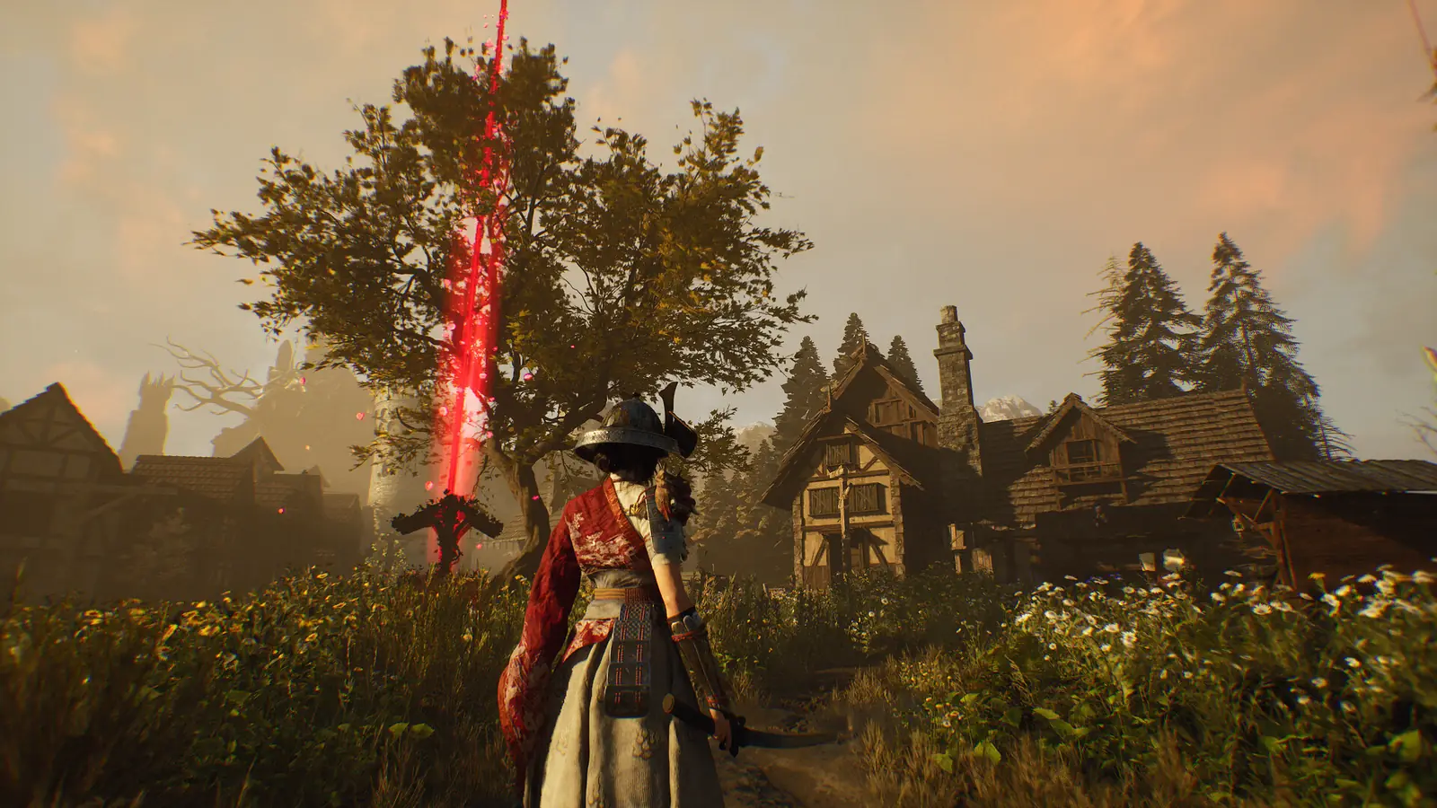 A red beacon rises over a village as a cloaked character approaches.